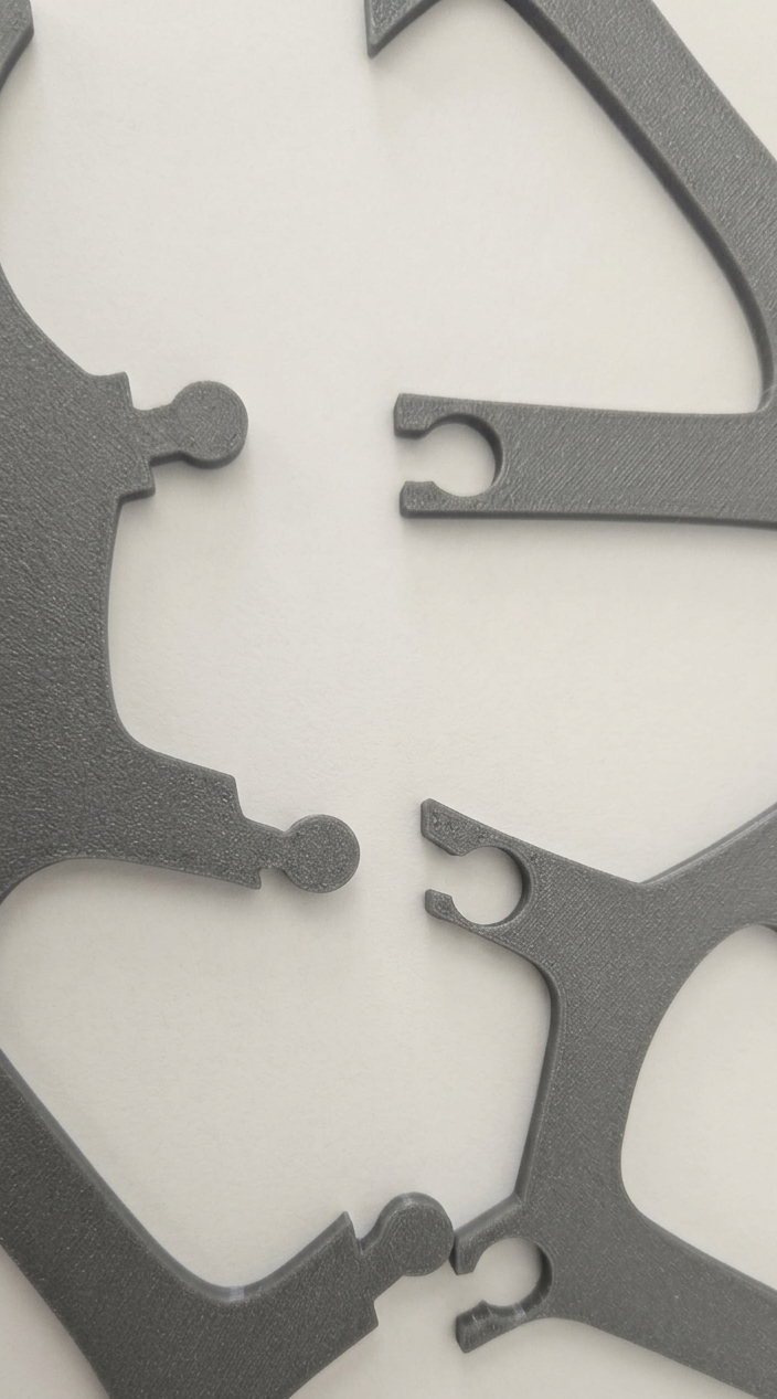 giraffe pattern panel connectors for a decorative panel laying on a flat surface
